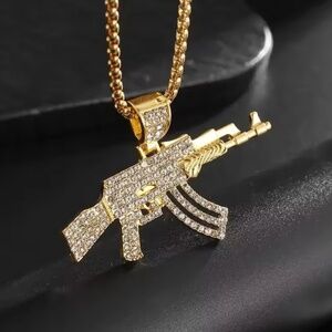 Gold plated AK-47 pendant iced out 3A CZ chain included